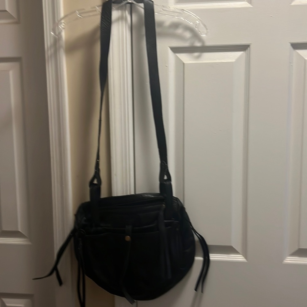 Genuine leather saddle bag- some fraying on the strap but still cute